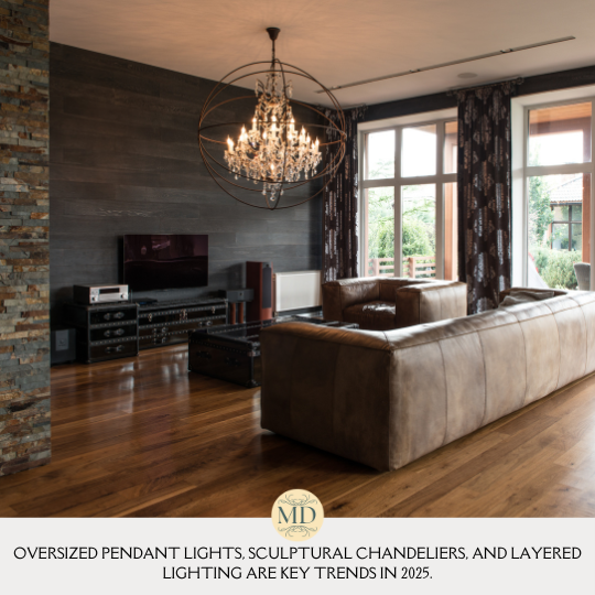 Oversized pendant lights, sculptural chandeliers, and layered lighting are key trends in 2025.