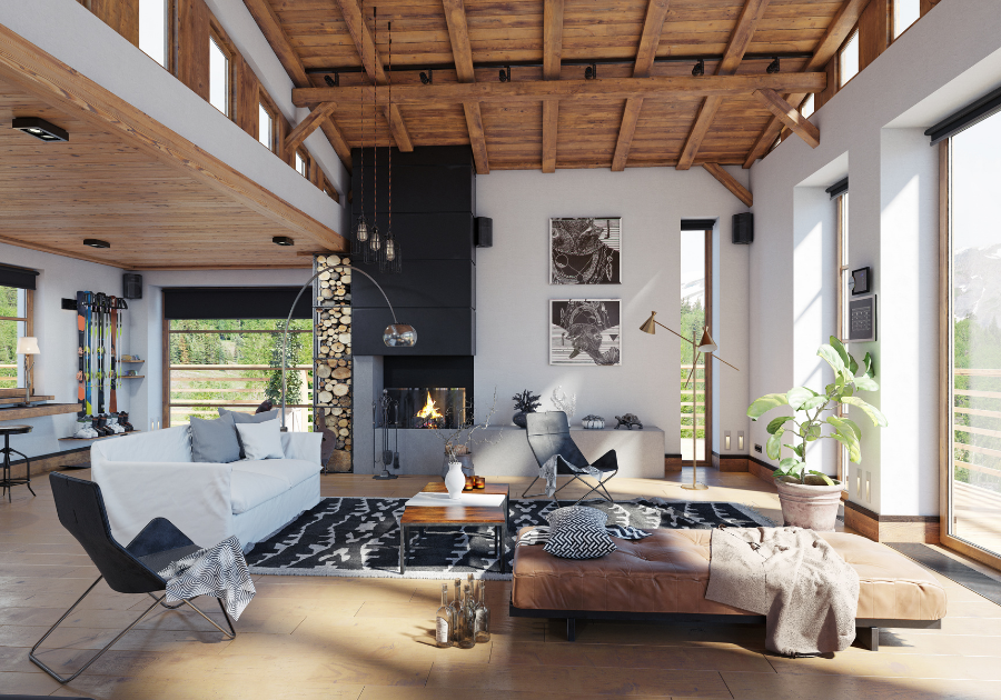 Modern rustic living room with original-style wood beams, warm wood trim, and neutral walls.
