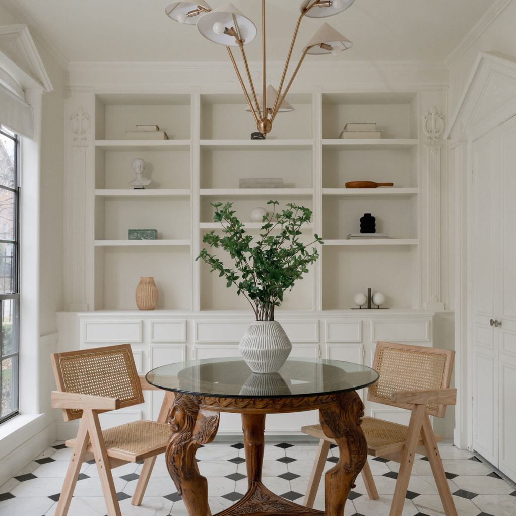 Thoughtful home staging draws attention to a historic home's built-ins.